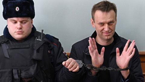 Alexei Navalny, who was arrested during March 26 anti-corruption rally, gestures during an appeal hearing at a court in Moscow on March 30, 2017