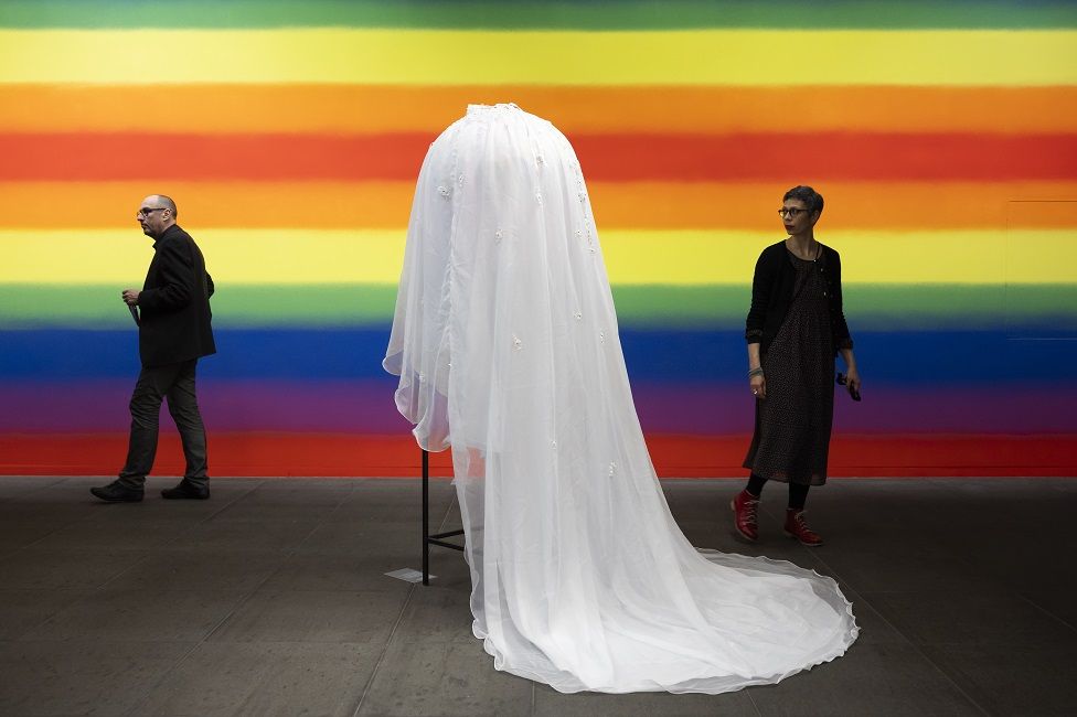 A white, draped artwork called "The Muti-ed Makhoti: Sheila"s Ball" on show in the Kunstmuseum in Bern, Switzerland, on 21 February. The exhibition runs until 11 August.