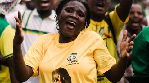 African National Congress (ANC) supporters dance ad they arrive at the Election Manifesto launch at the Moses Mabhida Stadium in Durban on February 24, 2024