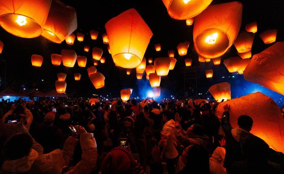 People release sky lanterns during the celebration of Sky Lantern Festival, in Pingxi, New Taipei City, Taiwan