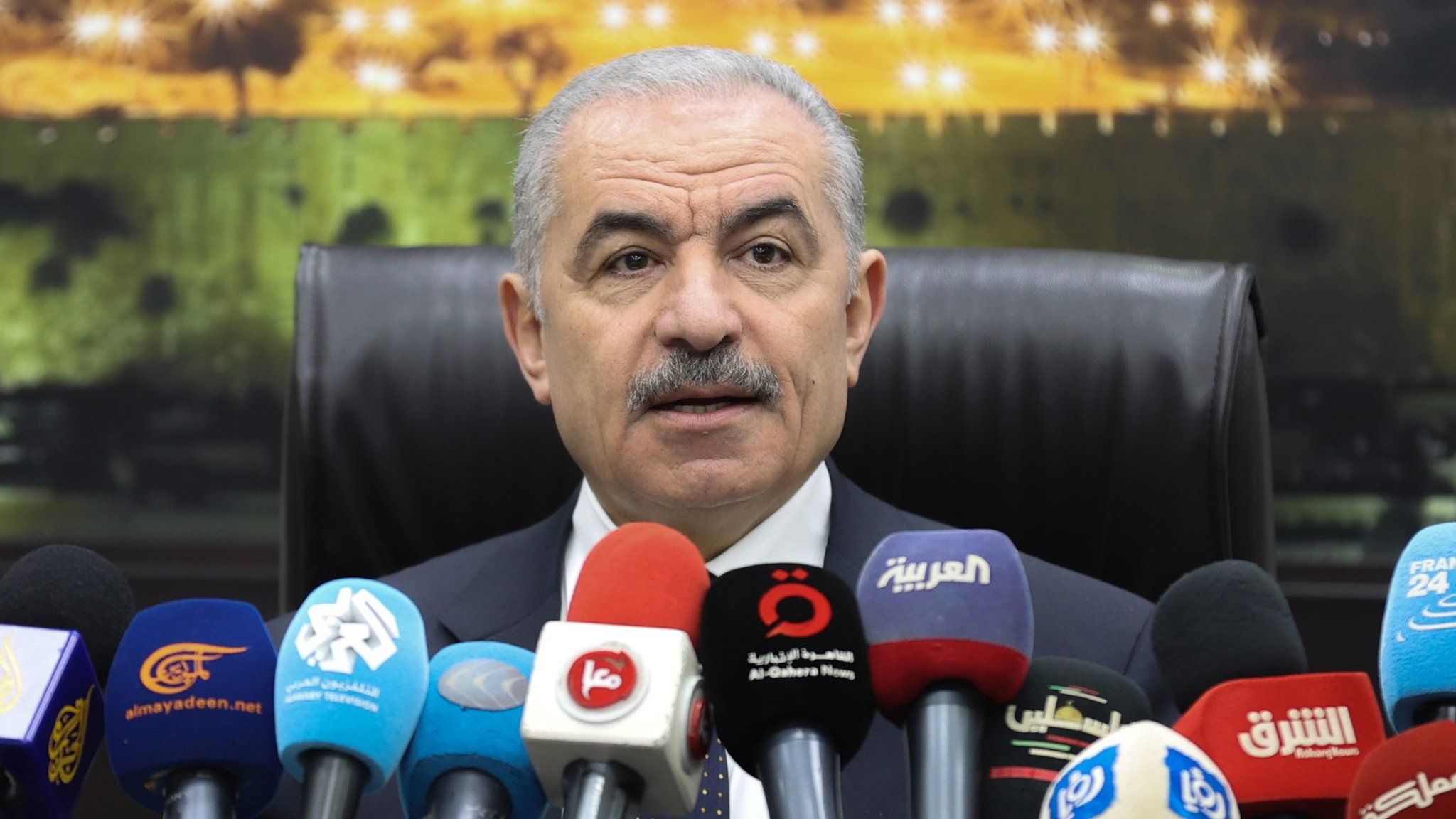 Palestinian Prime Minister Mohammed Shtayyeh announces the resignation of his government at a cabinet meeting in Ramallah, in the occupied West Bank (26 February 2024)