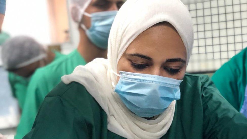 Nagham Mezied wears a face mask in hospital