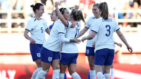England players celebrate Lauren Hemp's goal against Italy