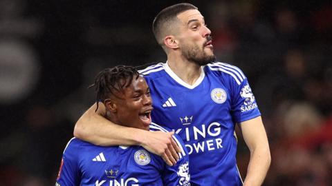 Abdul Fatawu of Leicester celebrates with Conor Coady after scoring in extra time against Bournemouth in the FA Cup fifth round