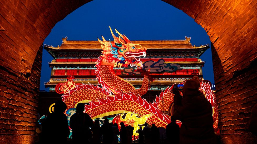 An illuminated red-and-golden dragon at a festival in China (Credit: Getty Images)