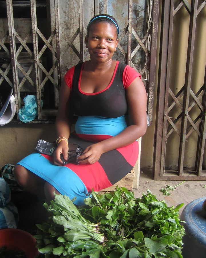 A local Esmeraldan woman sits for a portrait as she sells local, indigenous herbs at market (Credit: Pilar Egüez Guevara)