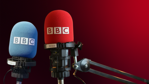 Two microphones with BBC logo on each